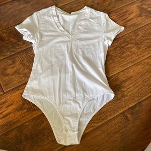 white tee bodysuit